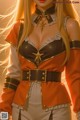 A woman in an orange and black outfit with a star on her chest.